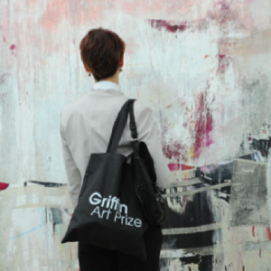 Griffin Gallery visitor with branding bag